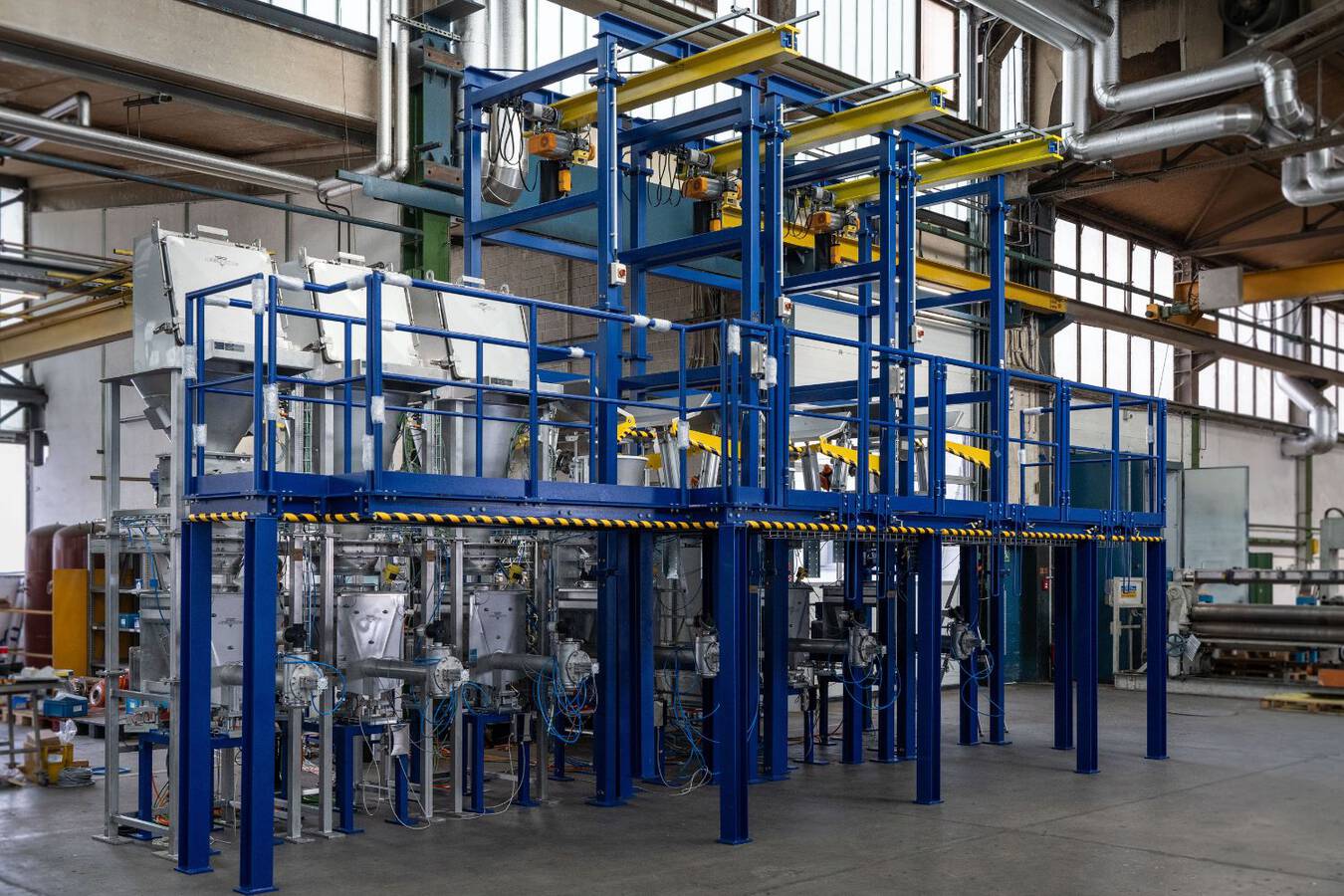 Easy emptying and dosing of poorly flowing bulk from bags and sacks Empty, Prepare, Dispense - Done. With this industrial plant emptying big bags and sacks and the precise dosing of poorly flowing bulk materials is becoming child’s play.